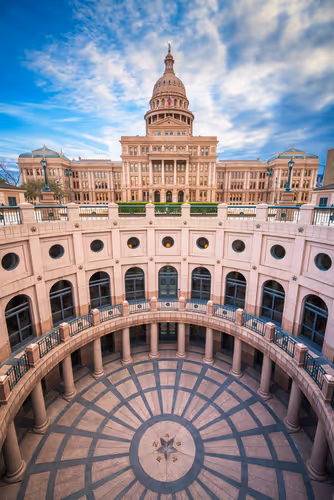 View of Austin’s Capitol building, representing structured leadership and institutional progress